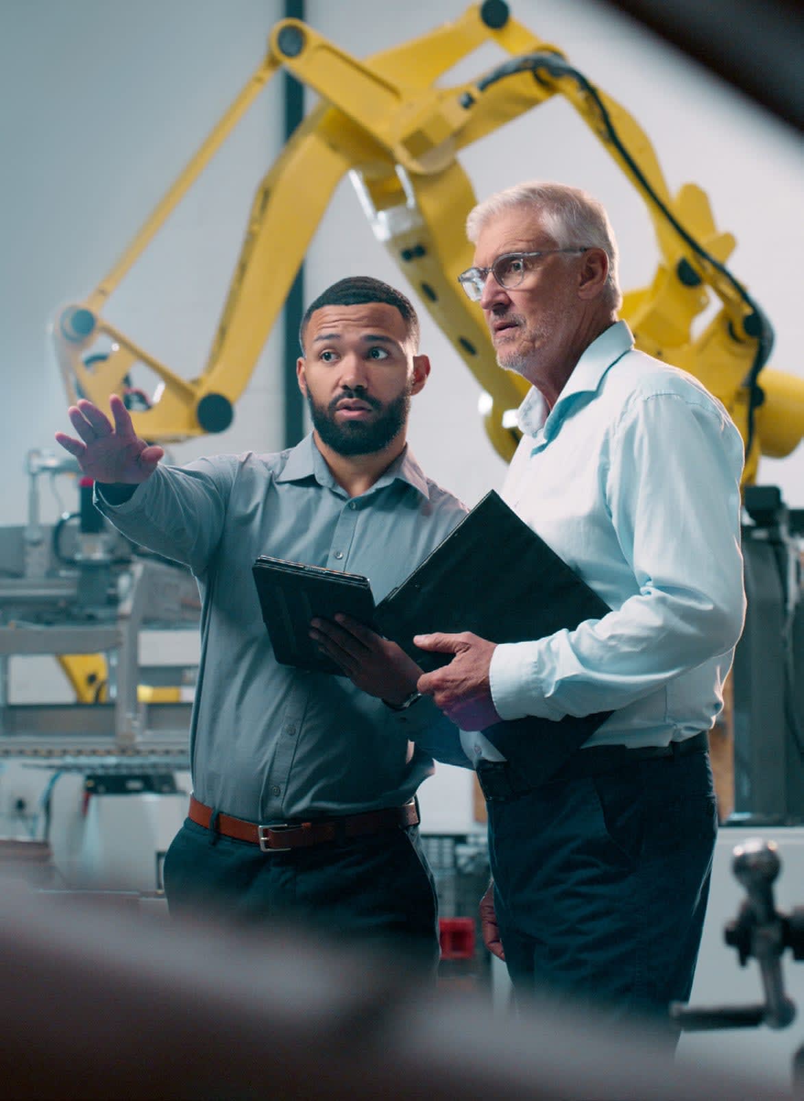 2 mans working for Rockwell