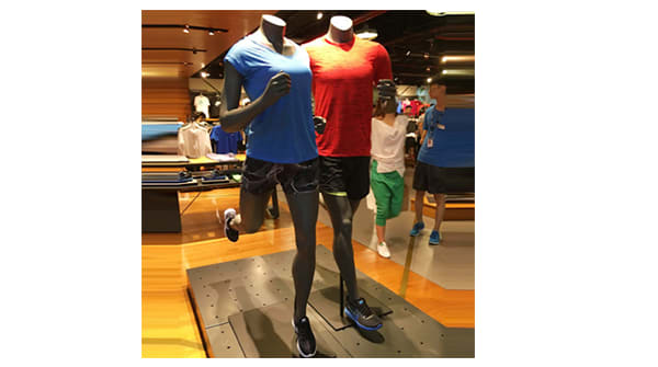 Mannequins display a "running" theme.