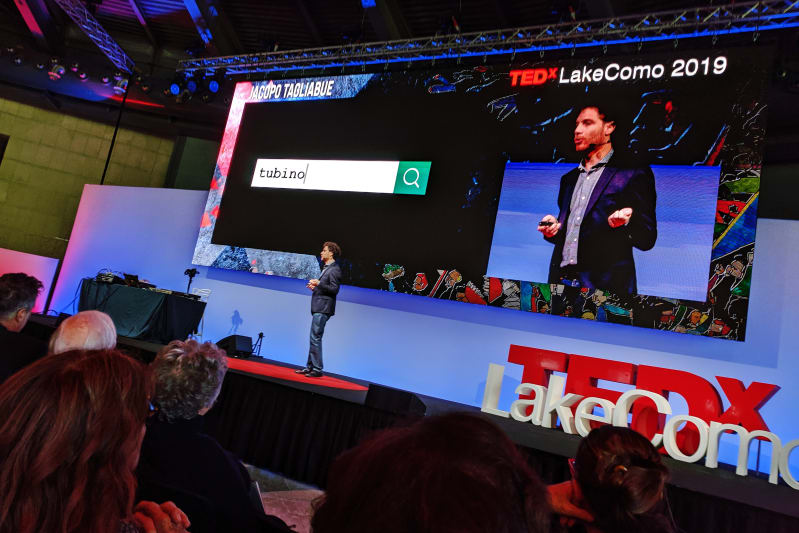 Jacopo giving a TED presentation