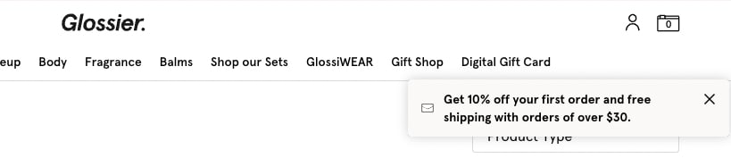 Example of Glossier's ecommerce personalization strategy Glossier offers special offer of free shipping and discount with first order